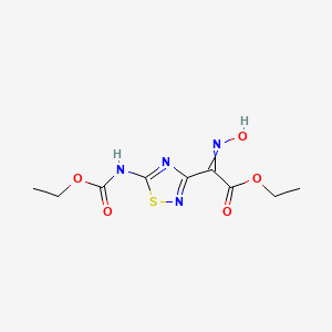 B1417802 Ethyl 2-(5-((ethoxycarbonyl)amino)-1,2,4-thiadiazol-3-yl)-2-(hydroxyimino)acetate CAS No. 1245652-38-3