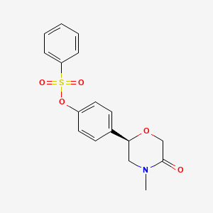 molecular formula C17H17NO5S B14186328 4-[(2R)-4-Methyl-5-oxomorpholin-2-yl]phenyl benzenesulfonate CAS No. 920803-44-7