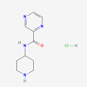 molecular formula C10H15ClN4O B1418776 N-(Piperidin-4-yl)pyrazine-2-carboxamide hydrochloride CAS No. 1185316-41-9