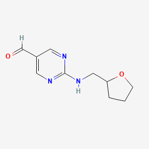 molecular formula C10H13N3O2 B1418860 2-[(Tetrahydrofuran-2-ylmethyl)amino]pyrimidine-5-carbaldehyde CAS No. 959239-06-6