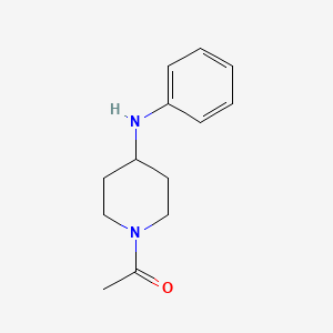 molecular formula C13H18N2O B1419243 1-[4-(苯氨基)哌啶-1-基]乙烷-1-酮 CAS No. 1157294-82-0