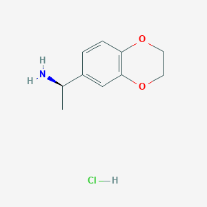 molecular formula C10H14ClNO2 B1419584 (1R)-1-(2,3-二氢-1,4-苯并二氧杂环-6-基)乙胺盐酸盐 CAS No. 1212291-95-6