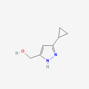 molecular formula C7H10N2O B1419845 (3-cyclopropyl-1H-pyrazol-5-yl)methanol CAS No. 1281984-39-1