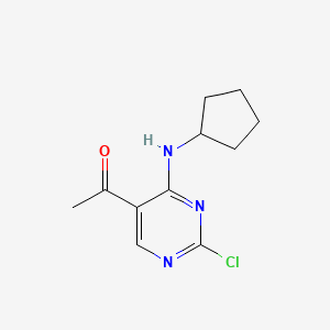 molecular formula C11H14ClN3O B1419897 1-(2-Chloro-4-(cyclopentylamino)pyrimidin-5-yl)ethanone CAS No. 1244949-62-9