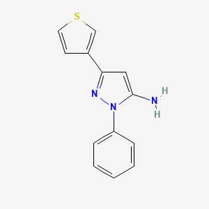 molecular formula C13H11N3S B1419998 1-phenyl-3-(thiophen-3-yl)-1H-pyrazol-5-amine CAS No. 1152668-05-7