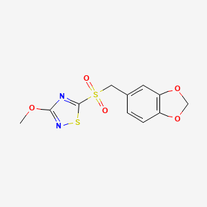 molecular formula C11H10N2O5S2 B14200532 5-[(2H-1,3-Benzodioxol-5-yl)methanesulfonyl]-3-methoxy-1,2,4-thiadiazole CAS No. 922504-56-1