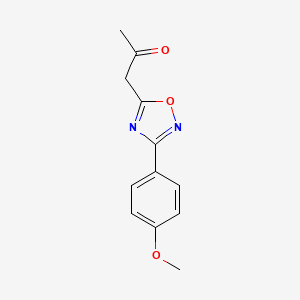 molecular formula C12H12N2O3 B1420082 1-[3-(4-Methoxyphenyl)-1,2,4-oxadiazol-5-yl]propan-2-one CAS No. 935469-35-5