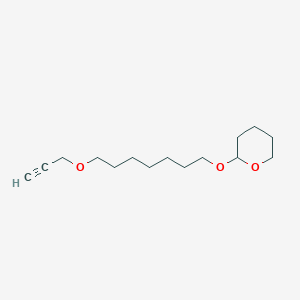 2-({7-[(Prop-2-yn-1-yl)oxy]heptyl}oxy)oxane