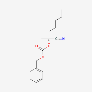 Benzyl (2R)-2-cyanoheptan-2-yl carbonate