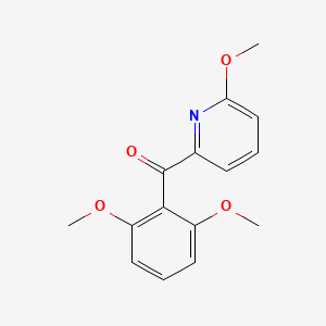 molecular formula C15H15NO4 B1421535 2-(2,6-Dimethoxybenzoyl)-6-methoxypyridine CAS No. 1187166-73-9