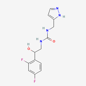 molecular formula C13H14F2N4O2 B1421907 1-[2-(2,4-difluorophenyl)-2-hydroxyethyl]-3-[(1H-pyrazol-3-yl)methyl]urea CAS No. 1223468-94-7