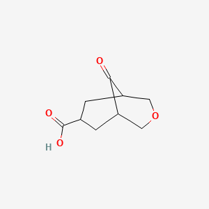 molecular formula C9H12O4 B1422675 9-氧代-3-氧杂双环[3.3.1]壬烷-7-羧酸 CAS No. 1333639-36-3
