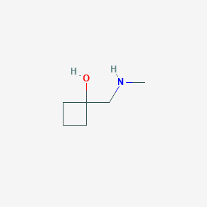 molecular formula C6H13NO B1422753 1-[(Methylamino)methyl]cyclobutan-1-ol CAS No. 1461706-88-6