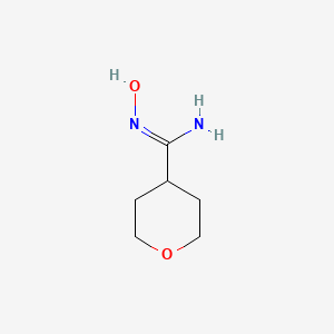 molecular formula C6H12N2O2 B1422836 N'-Hydroxyoxane-4-carboximidamide CAS No. 1251517-22-2