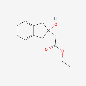 molecular formula C13H16O3 B1422889 2-(2-羟基-2,3-二氢-1H-茚满-2-基)乙酸乙酯 CAS No. 57932-04-4