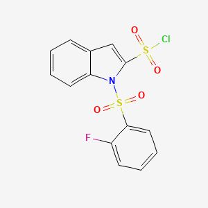 1-(2-Fluorobenzene-1-sulfonyl)-1H-indole-2-sulfonyl chloride