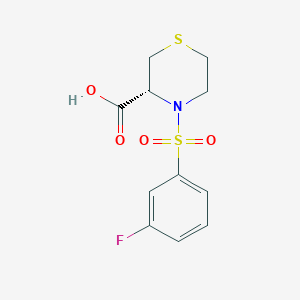 (3R)-4-(3-Fluorobenzene-1-sulfonyl)thiomorpholine-3-carboxylic acid