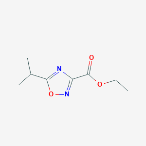 B1423807 5-Isopropyl-[1,2,4]oxadiazole-3-carboxylic acid ethyl ester CAS No. 153868-00-9