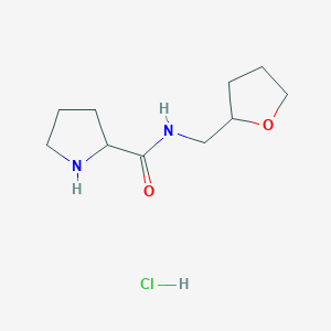 molecular formula C10H19ClN2O2 B1424066 N-(Tetrahydro-2-furanylmethyl)-2-pyrrolidinecarboxamide hydrochloride CAS No. 1236254-72-0