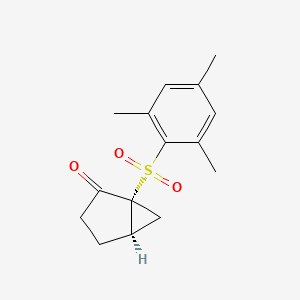 molecular formula C15H18O3S B14243620 (1R,5R)-1-(2,4,6-Trimethylbenzene-1-sulfonyl)bicyclo[3.1.0]hexan-2-one CAS No. 510730-05-9