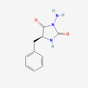 (5S)-3-Amino-5-benzylimidazolidine-2,4-dione