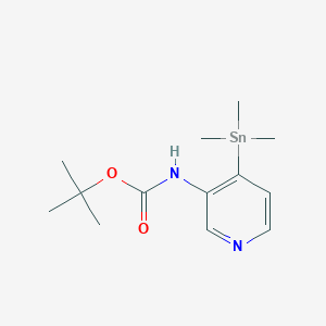 B14255909 Carbamic acid, [4-(trimethylstannyl)-3-pyridinyl]-, 1,1-dimethylethyl ester CAS No. 209681-13-0