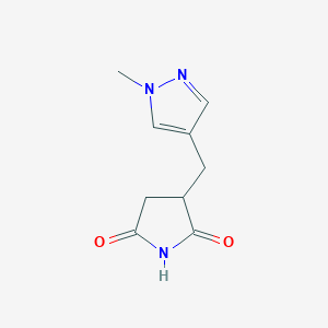 molecular formula C9H11N3O2 B1426314 3-[(1-methyl-1H-pyrazol-4-yl)methyl]pyrrolidine-2,5-dione CAS No. 1339095-21-4