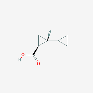 molecular formula C7H10O2 B1426449 反式-2-环丙基环丙烷-1-羧酸 CAS No. 15136-06-8