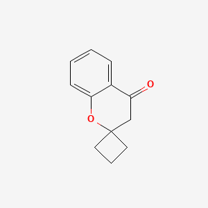 B1427130 Spiro[chroman-2,1'-cyclobutan]-4-one CAS No. 934554-40-2