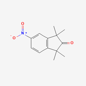 molecular formula C13H15NO3 B14272866 1,1,3,3-Tetramethyl-5-nitro-1,3-dihydro-2H-inden-2-one CAS No. 138349-97-0