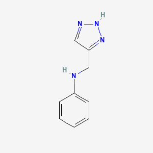 molecular formula C9H10N4 B1427575 N-(1H-1,2,3-三唑-5-基甲基)苯胺 CAS No. 165397-77-3