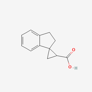 molecular formula C12H12O2 B1428062 2',3'-二氢螺[环丙烷-1,1'-茚] -3-羧酸 CAS No. 1250150-08-3