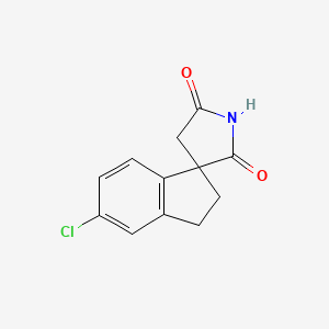 molecular formula C12H10ClNO2 B1428681 5-Chloro-2,3-dihydrospiro[indene-1,3'-pyrrolidine]-2',5'-dione CAS No. 956141-90-5
