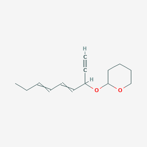 molecular formula C14H20O2 B14295392 2-[(Nona-4,6-dien-1-yn-3-yl)oxy]oxane CAS No. 113727-38-1