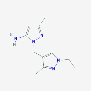 B1429621 1-[(1-ethyl-3-methyl-1H-pyrazol-4-yl)methyl]-3-methyl-1H-pyrazol-5-amine CAS No. 1415719-57-1