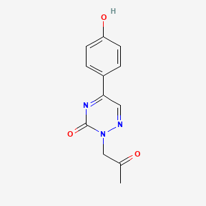 molecular formula C12H11N3O3 B14307326 5-(4-Oxocyclohexa-2,5-dien-1-ylidene)-2-(2-oxopropyl)-4,5-dihydro-1,2,4-triazin-3(2H)-one CAS No. 113912-99-5