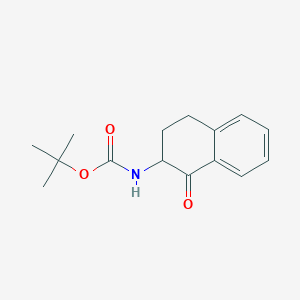 molecular formula C15H19NO3 B1430797 (1-Oxo-1,2,3,4-tetrahydro-naphthalen-2-yl)-carbamic acid tert-butyl ester CAS No. 75834-57-0