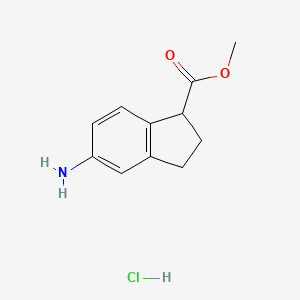 molecular formula C11H14ClNO2 B1430799 Methyl 5-amino-2,3-dihydro-1H-indene-1-carboxylate hydrochloride CAS No. 132205-73-3