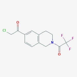 molecular formula C13H11ClF3NO2 B1430827 1-[6-(2-Chloroacetyl)-1,2,3,4-tetrahydroisoquinolin-2-yl]-2,2,2-trifluoroethan-1-one CAS No. 1803611-75-7