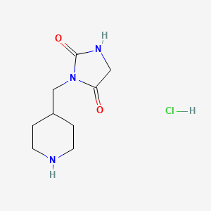molecular formula C9H16ClN3O2 B1431911 3-(Piperidin-4-ylmethyl)imidazolidine-2,4-dione hydrochloride CAS No. 1351647-38-5