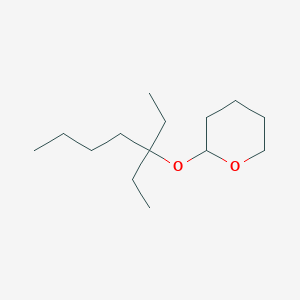 2-[(3-Ethylheptan-3-YL)oxy]oxane