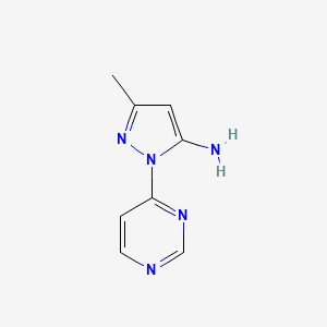 B1432473 3-methyl-1-(pyrimidin-4-yl)-1H-pyrazol-5-amine CAS No. 1502933-87-0