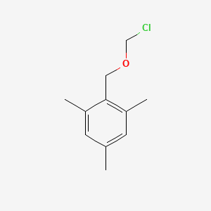 2-[(Chloromethoxy)methyl]-1,3,5-trimethylbenzene