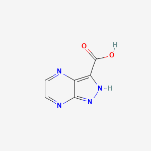 B1432661 1H-Pyrazolo[3,4-b]pyrazine-3-carboxylic acid CAS No. 1286754-47-9