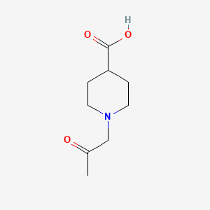 molecular formula C9H15NO3 B1432689 1-(2-氧代丙基)哌啶-4-羧酸 CAS No. 1397293-42-3