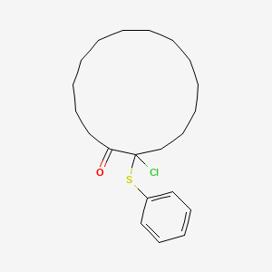 2-Chloro-2-(phenylsulfanyl)cyclopentadecan-1-one