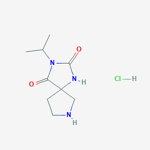 molecular formula C9H16ClN3O2 B1433212 3-(Propan-2-yl)-1,3,7-triazaspiro[4.4]nonane-2,4-dione hydrochloride CAS No. 1779128-57-2