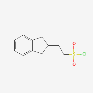 2-(2,3-dihydro-1H-inden-2-yl)ethane-1-sulfonyl chloride