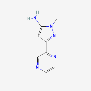 molecular formula C8H9N5 B1433743 1-甲基-3-(吡嗪-2-基)-1H-吡唑-5-胺 CAS No. 1414568-74-3