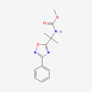 molecular formula C13H15N3O3 B1433807 Methyl (2-(3-phenyl-1,2,4-oxadiazol-5-yl)propan-2-yl)carbamate CAS No. 1374817-07-8
